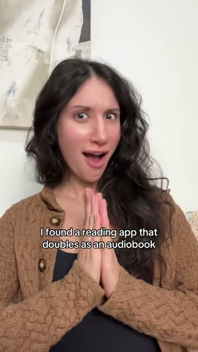 laura.befreed with hands together, caption: I found a reading app that doubles as an audiobook