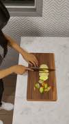 Compare the same kitchen chore in two worlds at 0:25