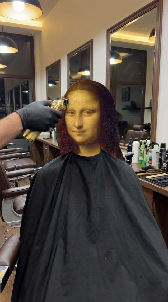 Mona Lisa in the chair, gold clippers at her temple. She does not smile.